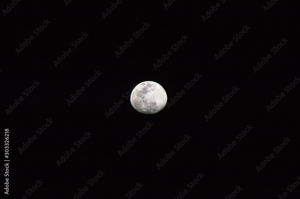 Crisp Full Moon At Night On Las Americas Beach. April 11, 2019. Santa Cruz De Tenerife Spain Africa. Travel Tourism Street Photography. Crisp Full Moon At Night On Las Americas Beach. April 11, 2019. Santa Cruz De Tenerife Spain Africa. Travel Tourism Street Photography.
