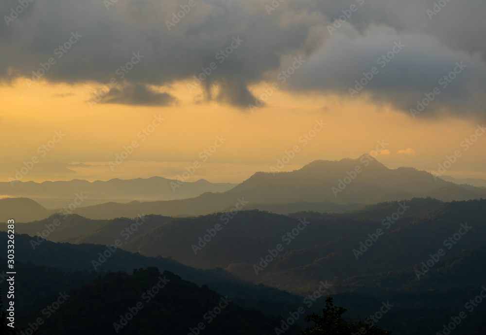 Natural scenery in the morning, mountains and fog with beautiful light.