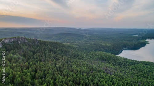 Rocks on a hill at sunset. Ural mountains. Chelyabinsk region. Russia photo