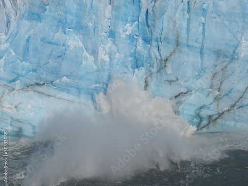 The moment glaciers collapse due to climate change, Close-up on a clear blue glacier, Perito Moreno Glacier, El Calafate, Los Glaciares National Park near El Chalten, Patagonia, Argentina