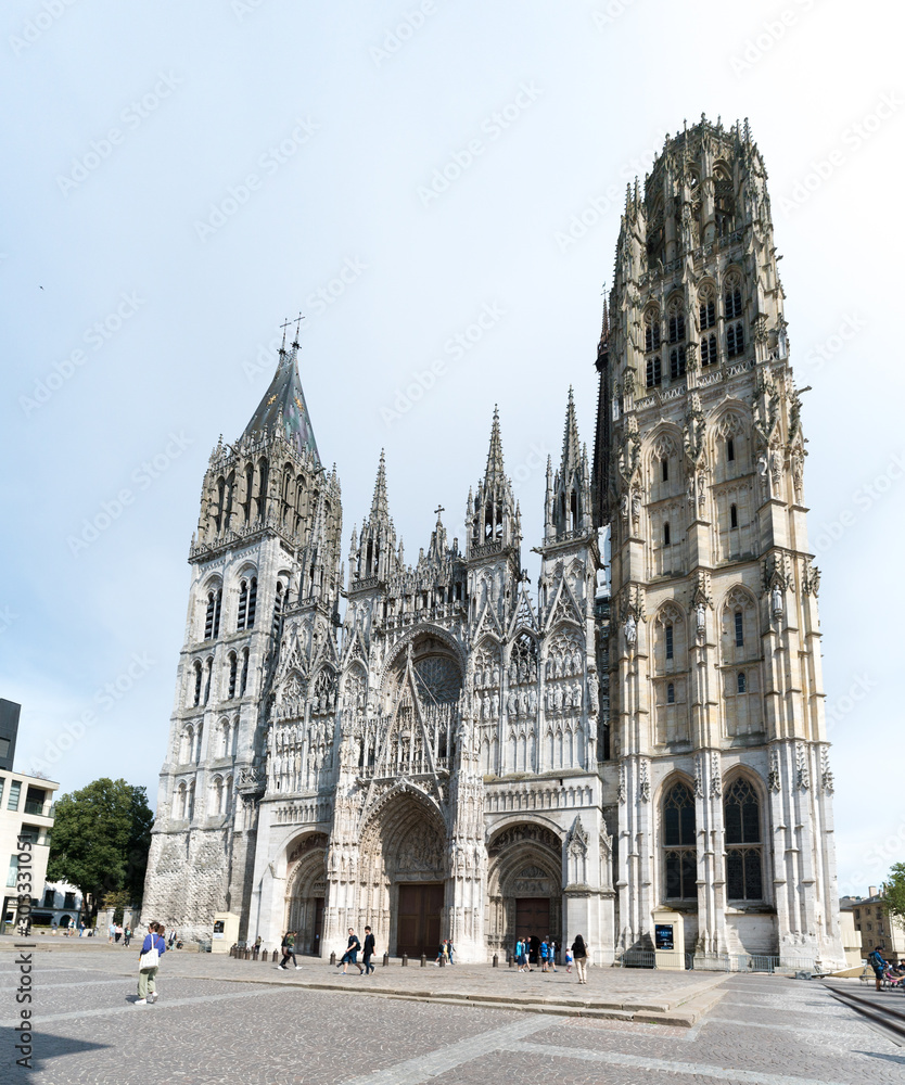 tourists enjoy a visit to Rouen and the historic cathedral