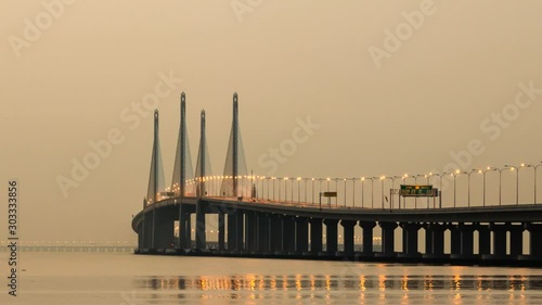 4K Time Lapse view of sunrise from Penang Bridge of George Town