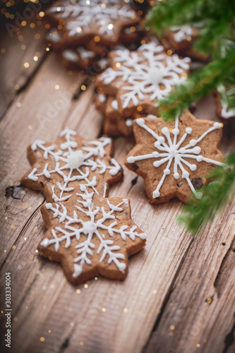christmas gingerbread cookies on wooden background