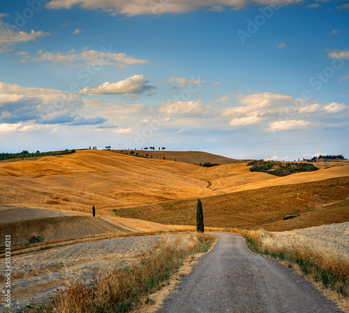 Beautiful Tuscany landscape with road and clouds