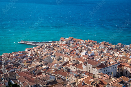 Aerial view of Cefalu Historical Center and sea coastline. Sicily, Italy
