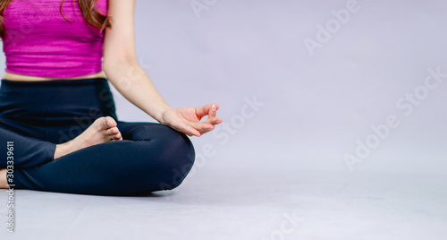 Women doing yoga for health Exercise in the room Concept of health care and good shape