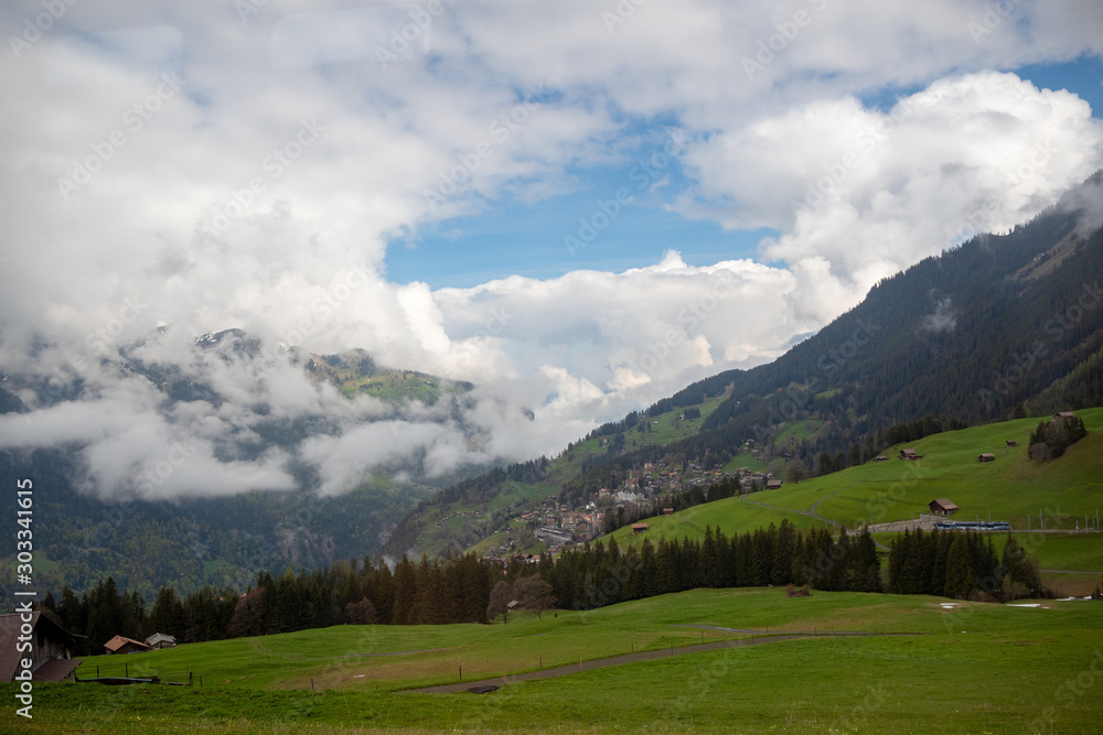 Beautiful landscape view in rural area of Switzerland with blue sky with cloud for background with copy space, Switzerland