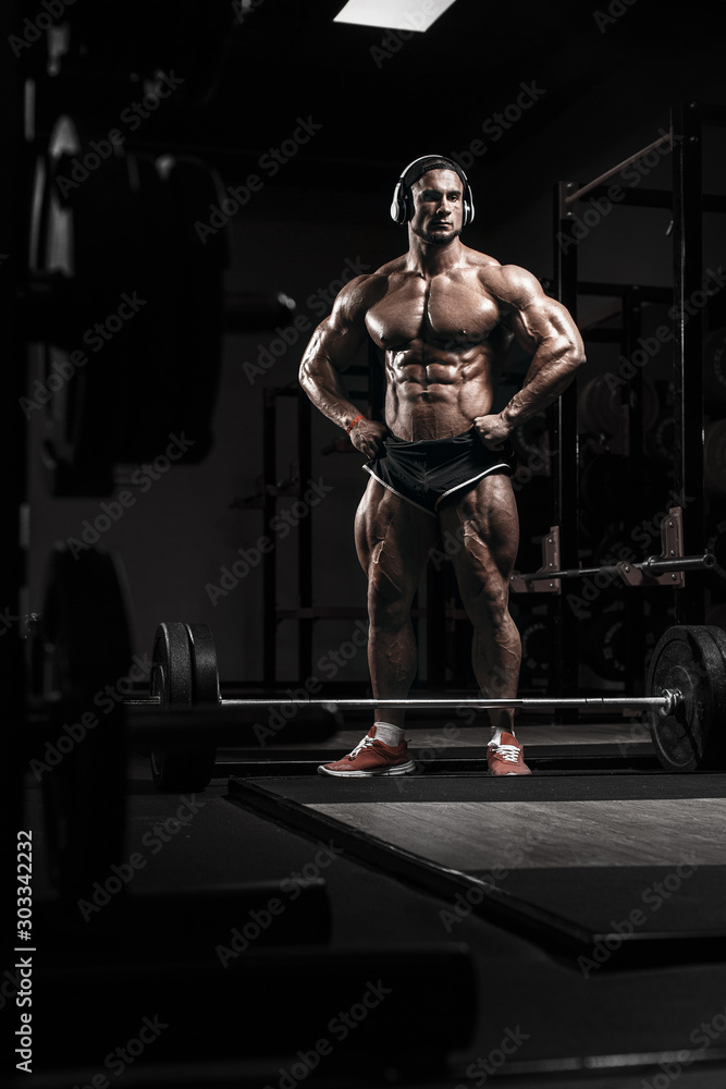 Premium Photo | Professional athlete posing in the gym. bodybuilding and  fitness concept.