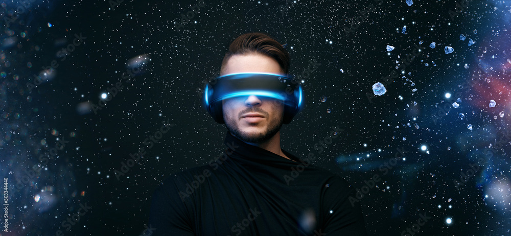 Man in glasses of virtual reality on dark space magic background. Augmented  reality, future technology concept. VR. Futuristic glasses with virtual  projection. Blue neon light. foto de Stock | Adobe Stock