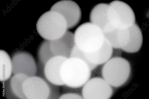 Abstract black and white Lights bokeh background. Blured night light. background, 