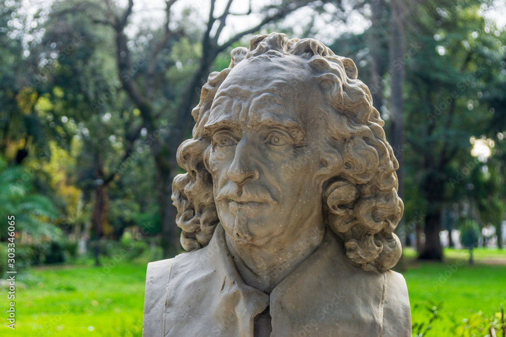Old marble bust of Gian Lorenzo Bernini in the public park Pincian Hill, Villa Borghese gardens, Rome, Italy