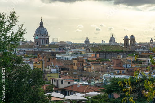 panorama of Rome with the dome of San Carlo al Corso in the backgroundf rom the public park Pincian Hill, Villa Borghese gardens, Rome, Italy