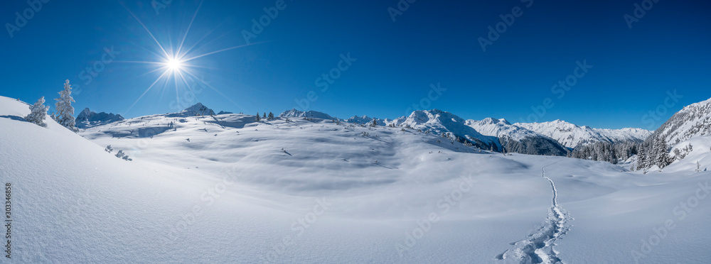 Fototapeta Winterpanorama in den Alpen