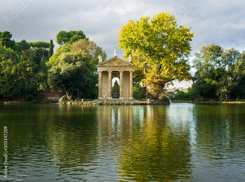 Temple of Aesculapius (19th century) in the public park Pincian Hill, Villa Borghese gardens, Rome, Italy