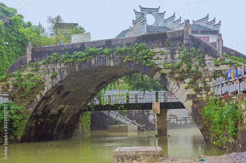 Ancient bridges over the Li River in the old town of Daxuzhen photo