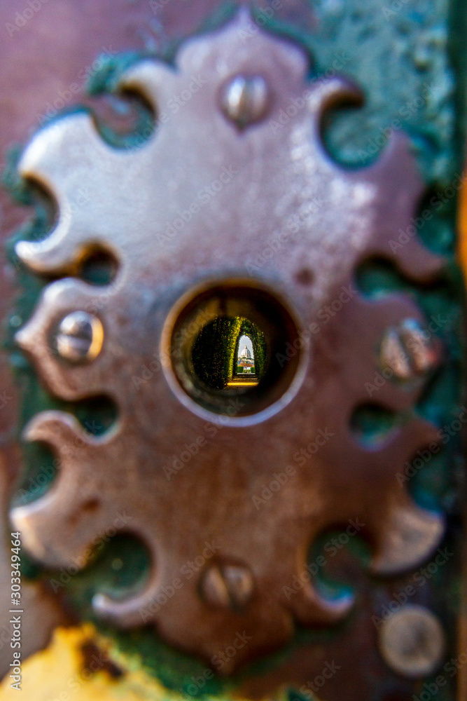 Distant view of Saint Peter's Basilica through the blurred Aventine  Keyhole, Il Buco Della Serratura, blurred escutcheon, abstract image in  Rome, Italy Stock Photo | Adobe Stock