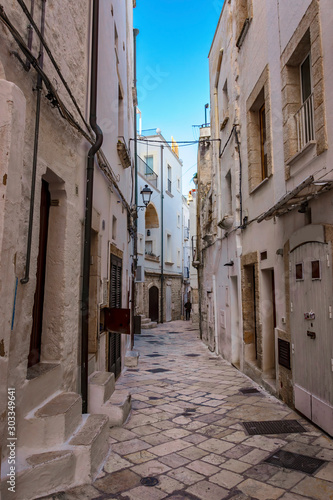 Evening winter on the streets of Polignano a Mare Old Town, Bari Province, Puglia region, southern Italy.