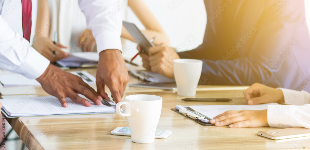 Brainstorming Group of people Working Concept. Business team brainstorming. Marketing plan researching. Paperwork on the table Brainstorming Group of people Working Concept. Business team brainstorming. Marketing plan researching. Paperwork on the table