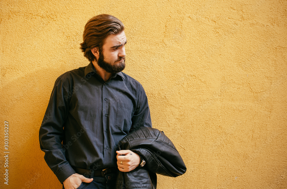 Portrait of bearded handsome young man. Portrait of bearded handsome young man.