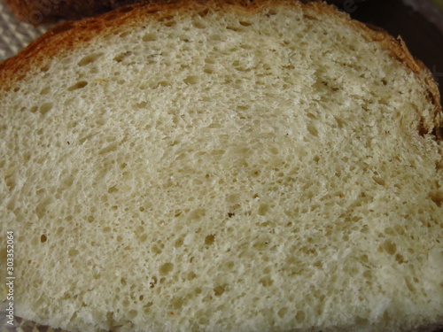 homemade baked white bread coarsely photo