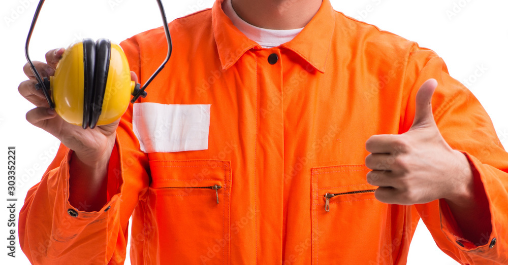 Fotografie Construction worker with noise cancelling earphones