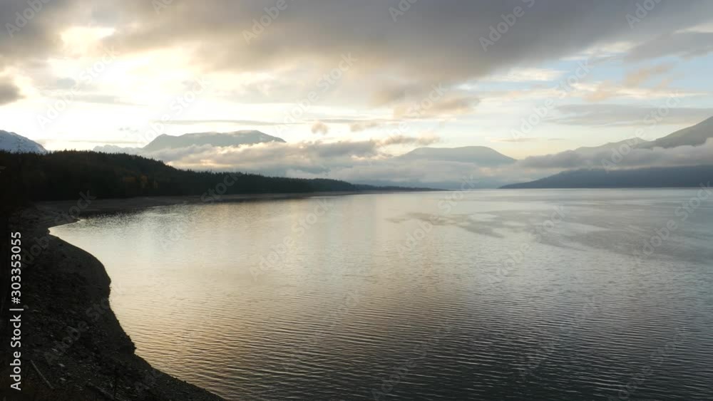 Pan Of Beautiful British Columbia Lake With Mountains and Low Clouds Pan Of Beautiful British Columbia Lake With Mountains and Low Clouds