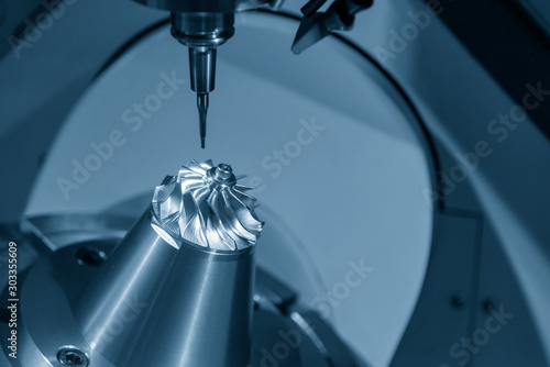 The  5-axis CNC milling machine  cutting the hi-precision automotive  by solid ball endmill tools. The hi technology of impeller parts of turbocharger manufacturing process by 5-axis machining center.