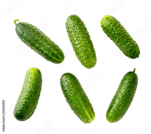 Set of ripe cucumbers carved on a white. photo