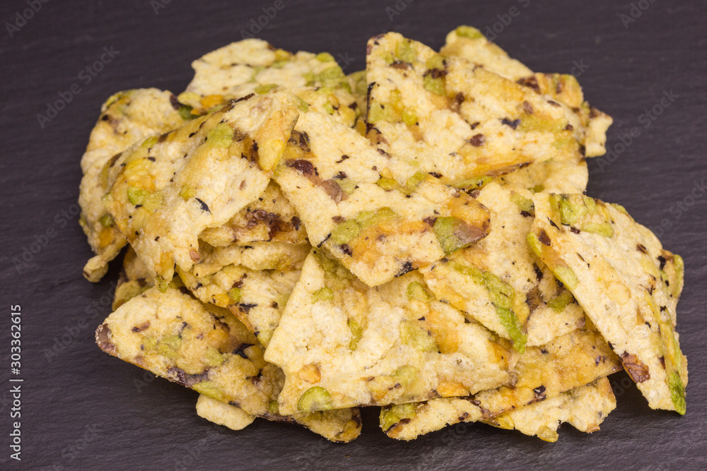 healthy snack of crisps with chickpea, green and yellow peas and black beans healthy snack of crisps with chickpea, green and yellow peas and black beans