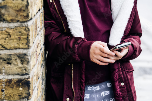 Young girl using a mobile phone