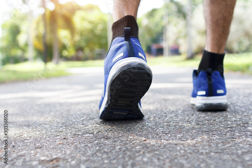 closeup of male running walking shoes. Work out concept, step walk