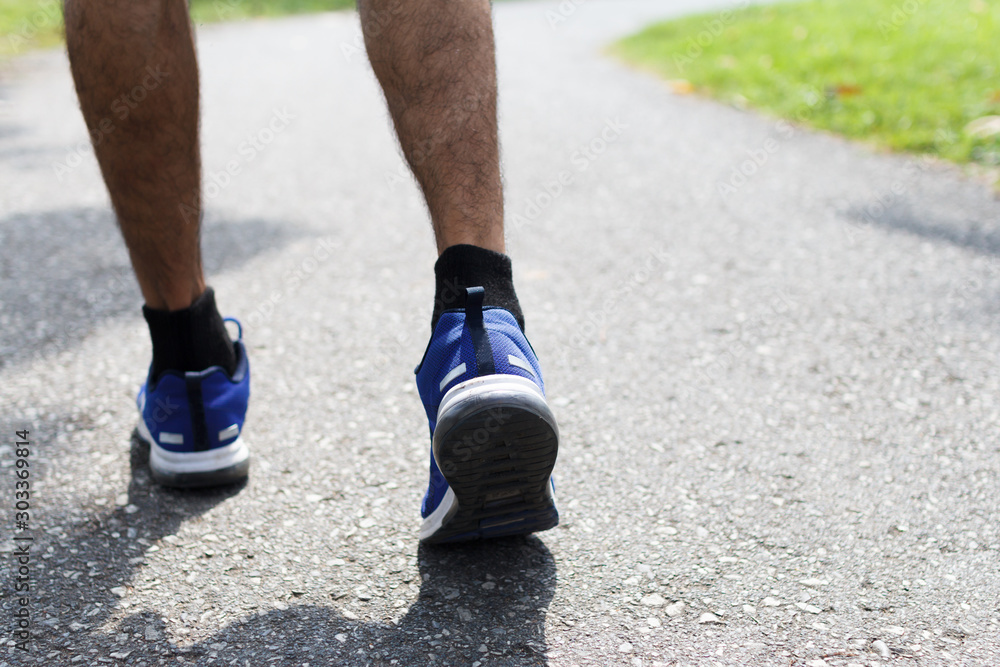 closeup of male running walking shoes. Work out concept, step walk closeup of male running walking shoes. Work out concept, step walk