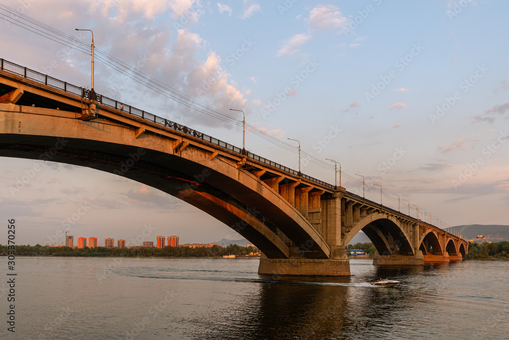 Krasnoyarsk Bridge. Yenisei. The clouds. Sky. Krasnoyarsk Bridge. Yenisei. The clouds. Sky.