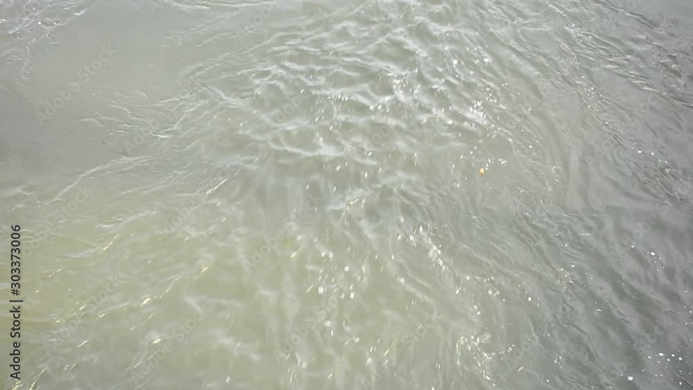 Rapid flow of a mountain river Rapid flow of a mountain river