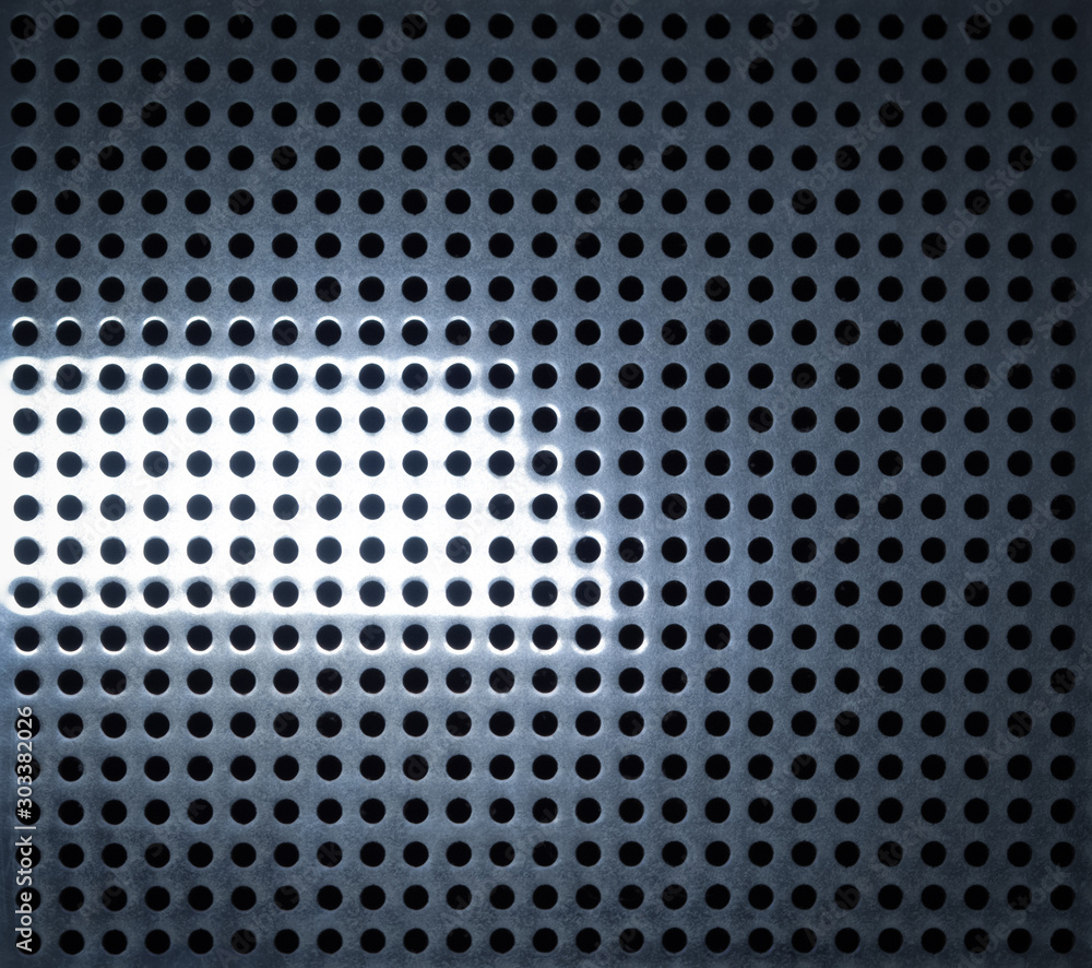 Metal abstact background with holes and light glare Metal abstact background with holes and light glare