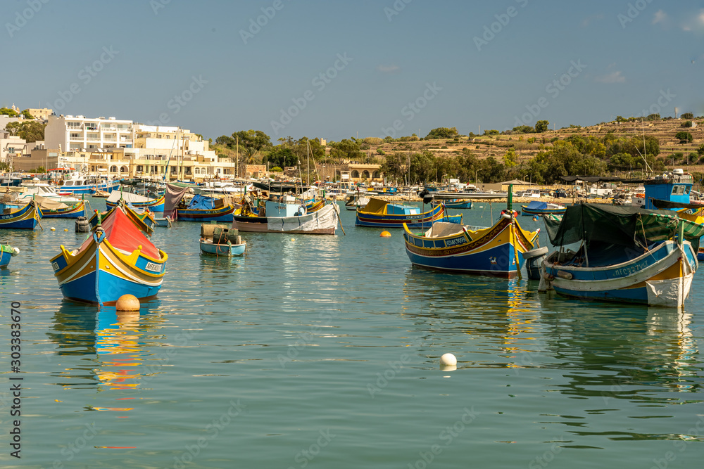 view of the harbor with boats, of marsaxlokk on malta