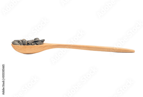 Sunflower seeds in a spoon