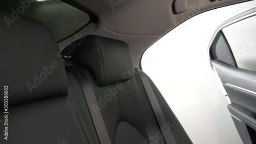 beautiful leather car interior design. luxury leather seats in the car. Black leather seat covers in car. artificial leather rear seats in the car. © zoteva87