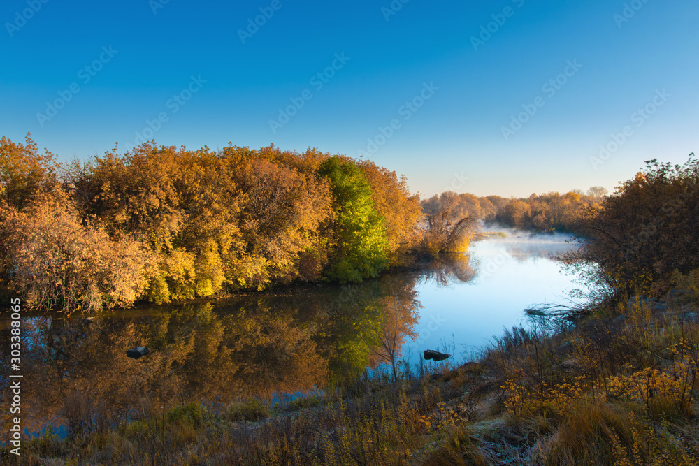 autumn landscape by the river in the morning autumn landscape by the river in the morning