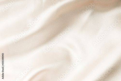 beige silk fabric texture. Satin Background photo
