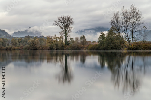 Reflection of trees in the water, autumn landscape
