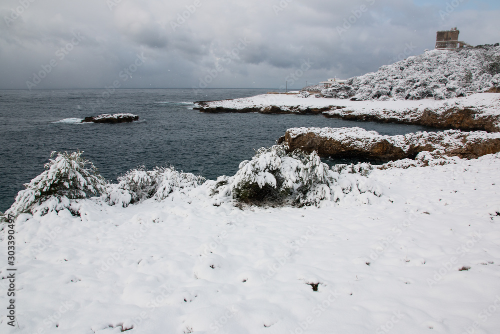 Ionian coast after a exceptional snowfall, Salento, Italy