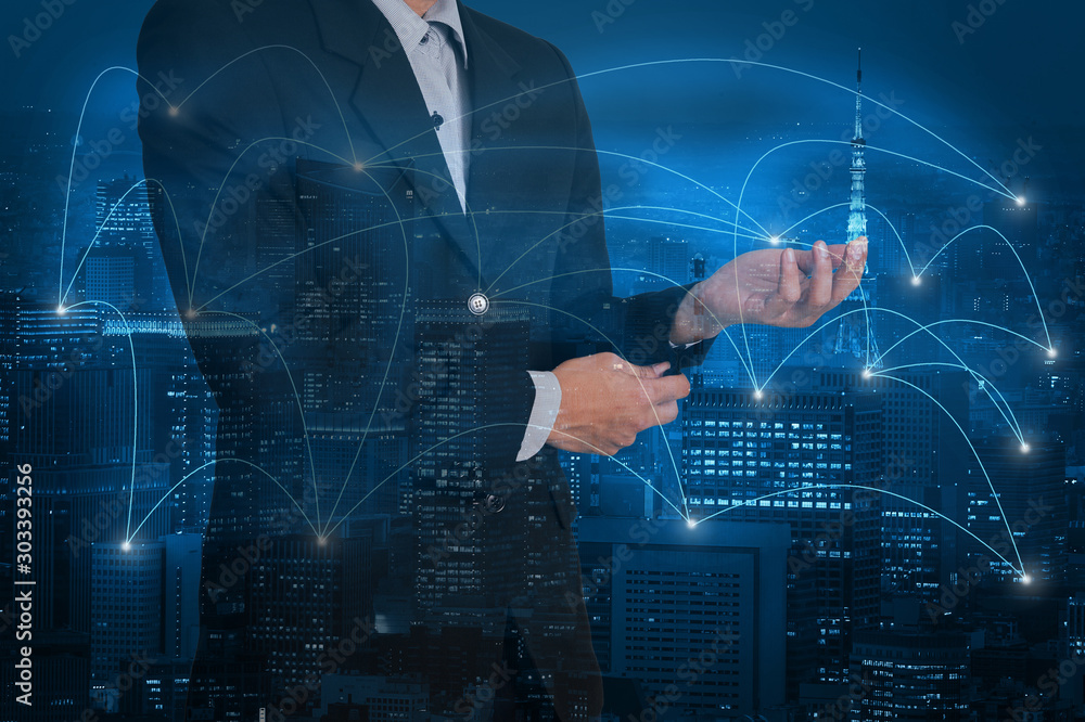 Double exposure businessman on business network trading and city background Double exposure businessman on business network trading and city background
