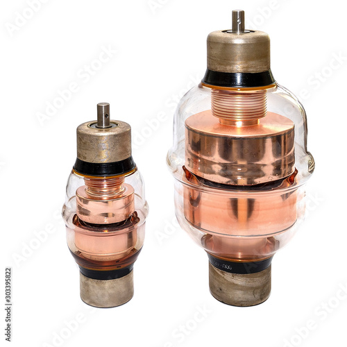 Two high voltage vacuum capacitors. Glass capacitors insulated powerful adjustable. Large high-voltage vacuum capacitor of variable.
