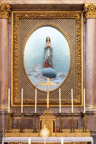 Beautiful Virgin Mary statue in Eglise Saint Vincent de Paul in the ancient center of Blois in France photo