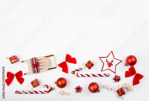 New Year background, red balls and gifts on a white background. Christmas 2020 concept, copy space. photo