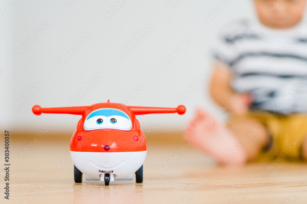 BANGKOK, THAILAND - MARCH 05,2019: Jett by Super Wings  baby boy  watching cartoon movie in Netflix at  wing is favorite cartoon in  Netflix. Stock Photo | Adobe Stock