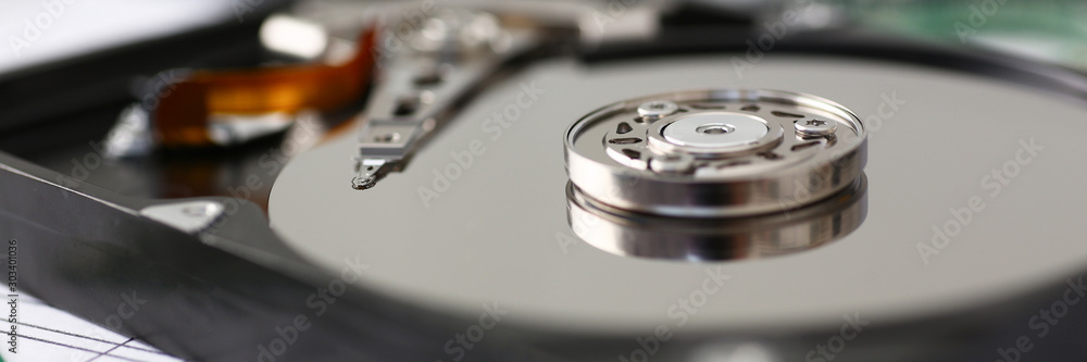 Hard drive from computer or laptop lies on the table Hard drive from computer or laptop lies on the table