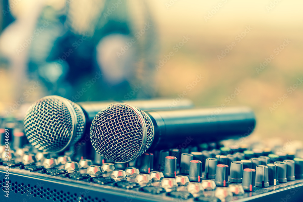 Obraz premium Microphone on sound mixer close up