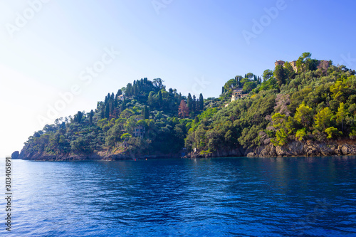 Old medieval castle, located on a hill near harbor of Portofino town, Italy © Solarisys